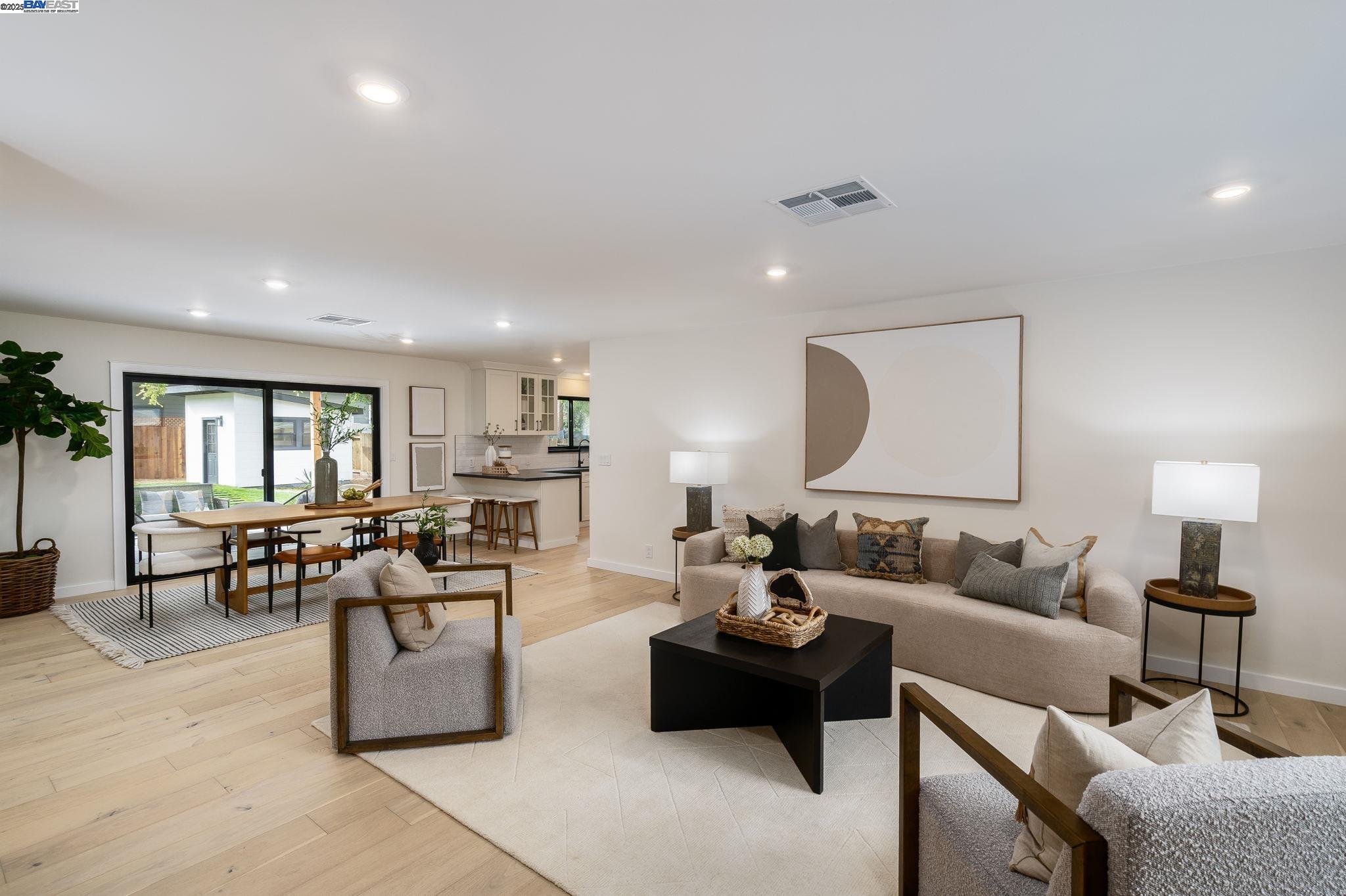 1425 Camino Verde Walnut Creek, CA 94597 - Photo 4 of 28 a living room with furniture and a wooden floor