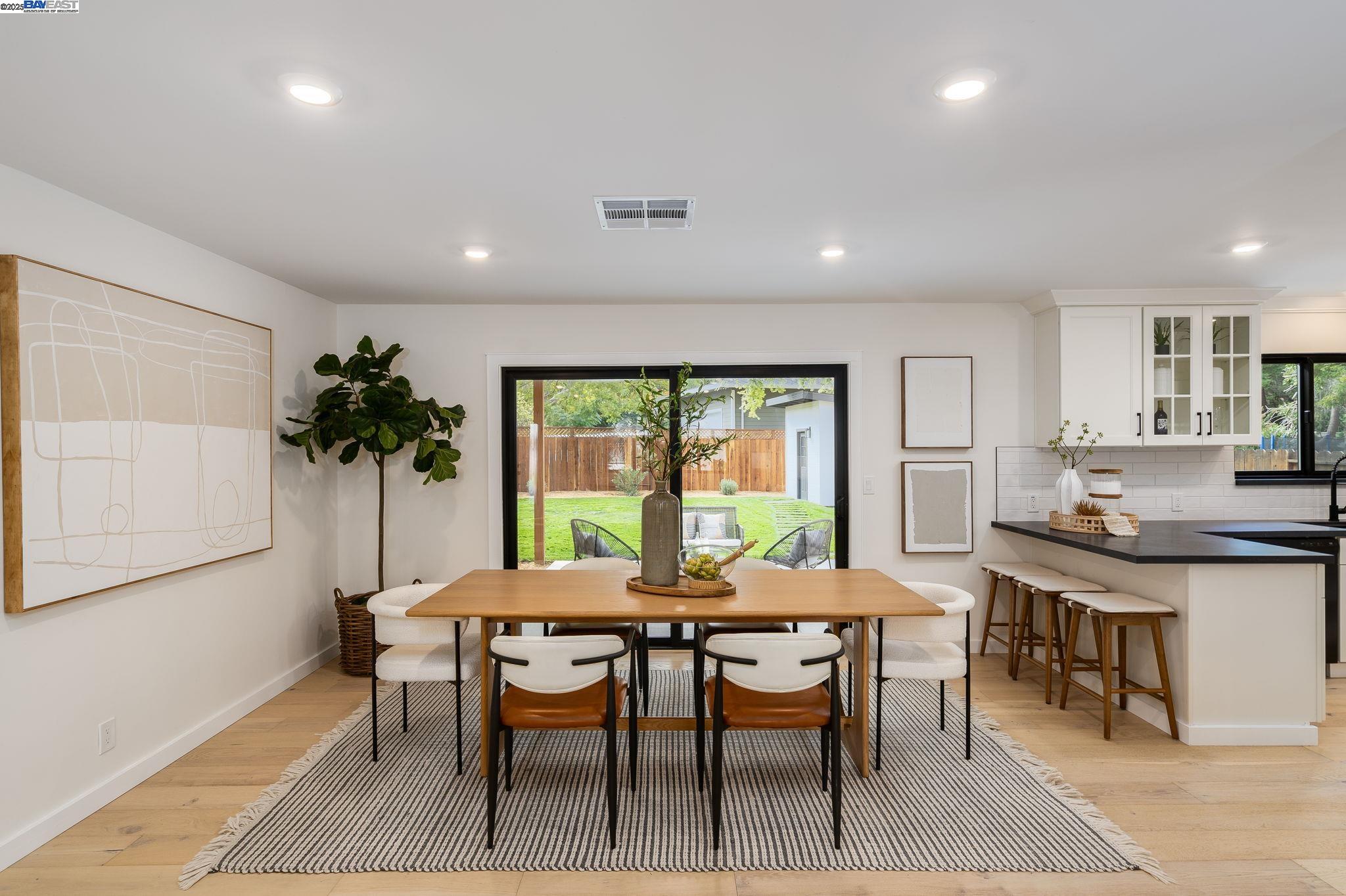 1425 Camino Verde Walnut Creek, CA 94597 - Photo 5 of 28 a view of a dining room with furniture window and wooden floor
