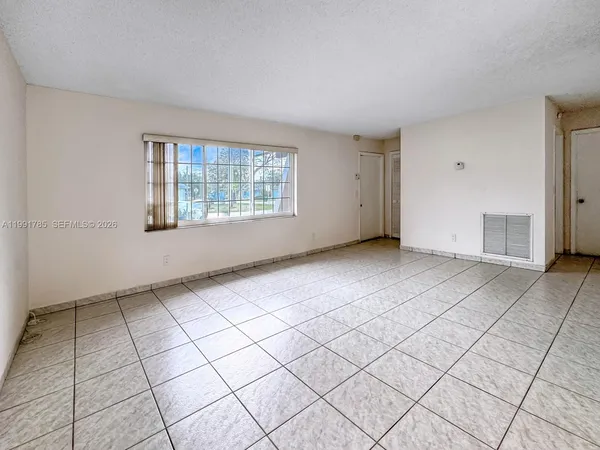 a bedroom with furniture and a fireplace