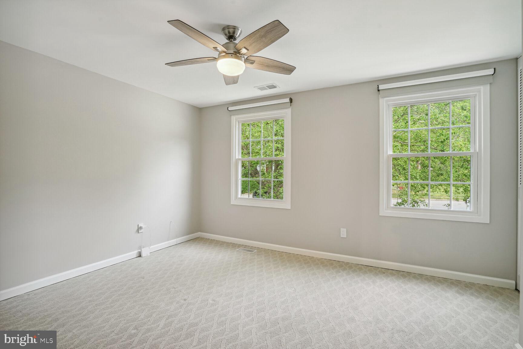 7586 Vogels Way Springfield, VA 22153 - Photo 29 of 42 Bedroom 2 with fan and automatic blinds