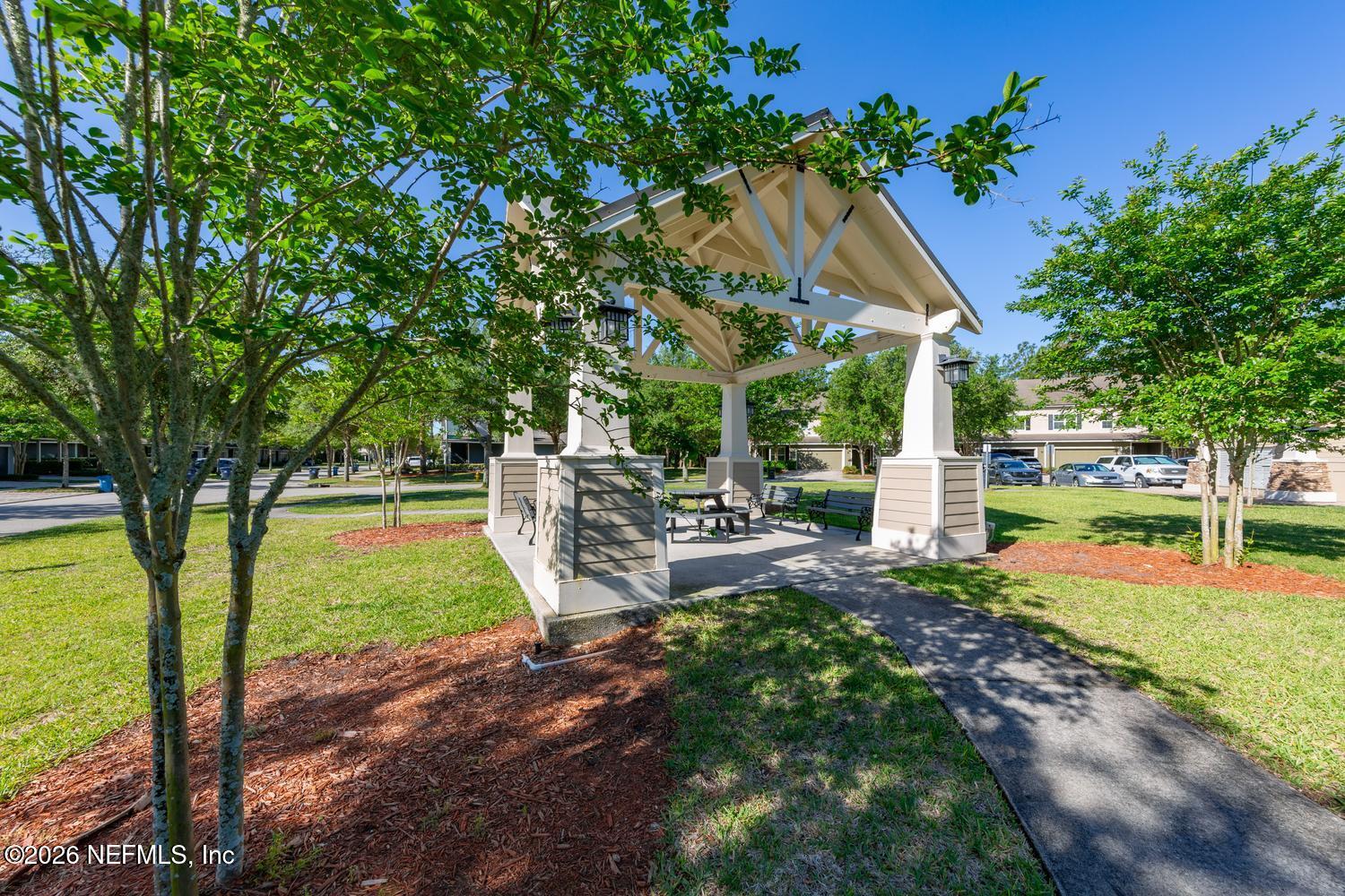 29 Myrtle Park Point Ponte Vedra, FL 32081 - Photo 12 of 59 a view of a house with backyard and sitting area