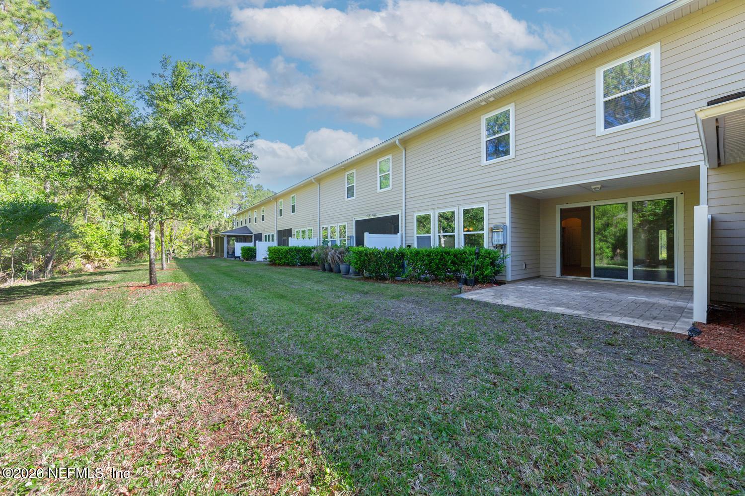 29 Myrtle Park Point Ponte Vedra, FL 32081 - Photo 14 of 59 a view of a house with backyard and garden