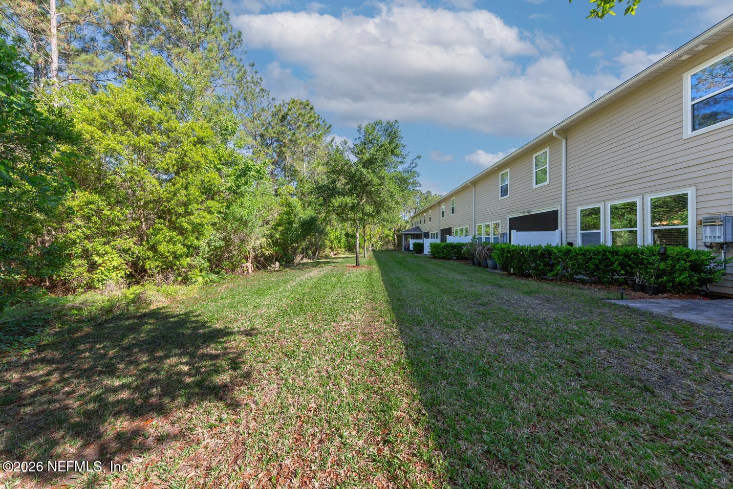 29 Myrtle Park Point Ponte Vedra, FL 32081 - Photo 15 of 59 a view of a house with a yard