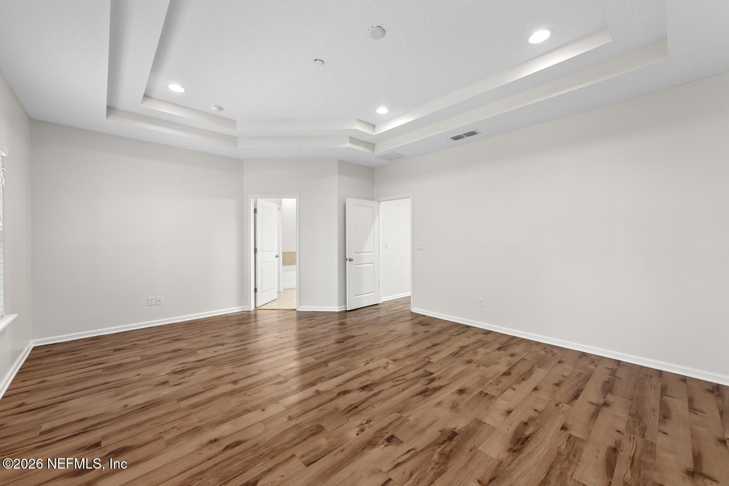 29 Myrtle Park Point Ponte Vedra, FL 32081 - Photo 30 of 59 a view of an empty room with wooden floor