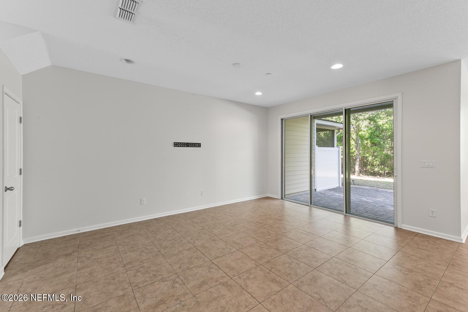29 Myrtle Park Point Ponte Vedra, FL 32081 - Photo 3 of 59 a view of an empty room with glass door