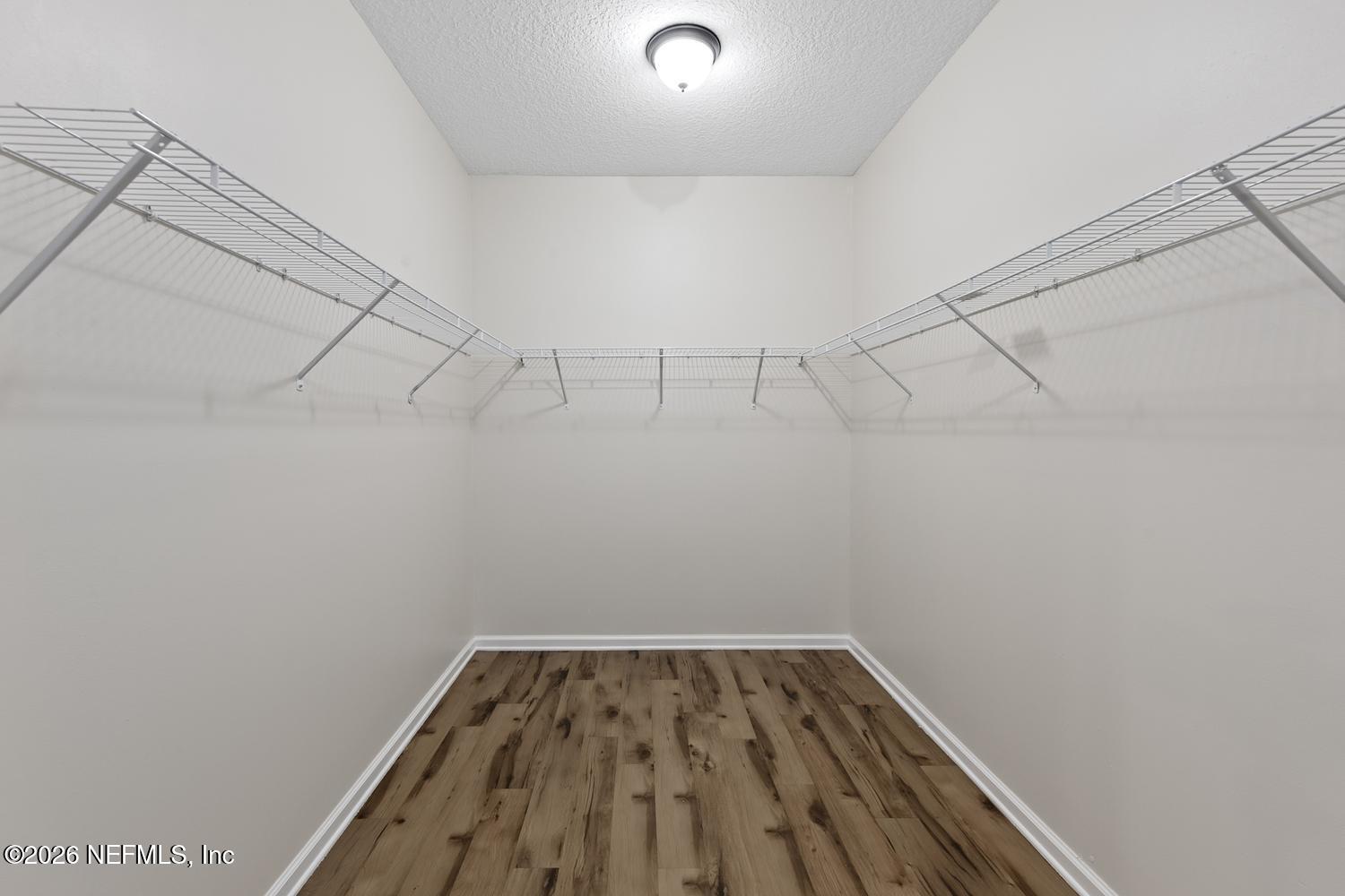 29 Myrtle Park Point Ponte Vedra, FL 32081 - Photo 31 of 59 a view of a room with racks on the wall