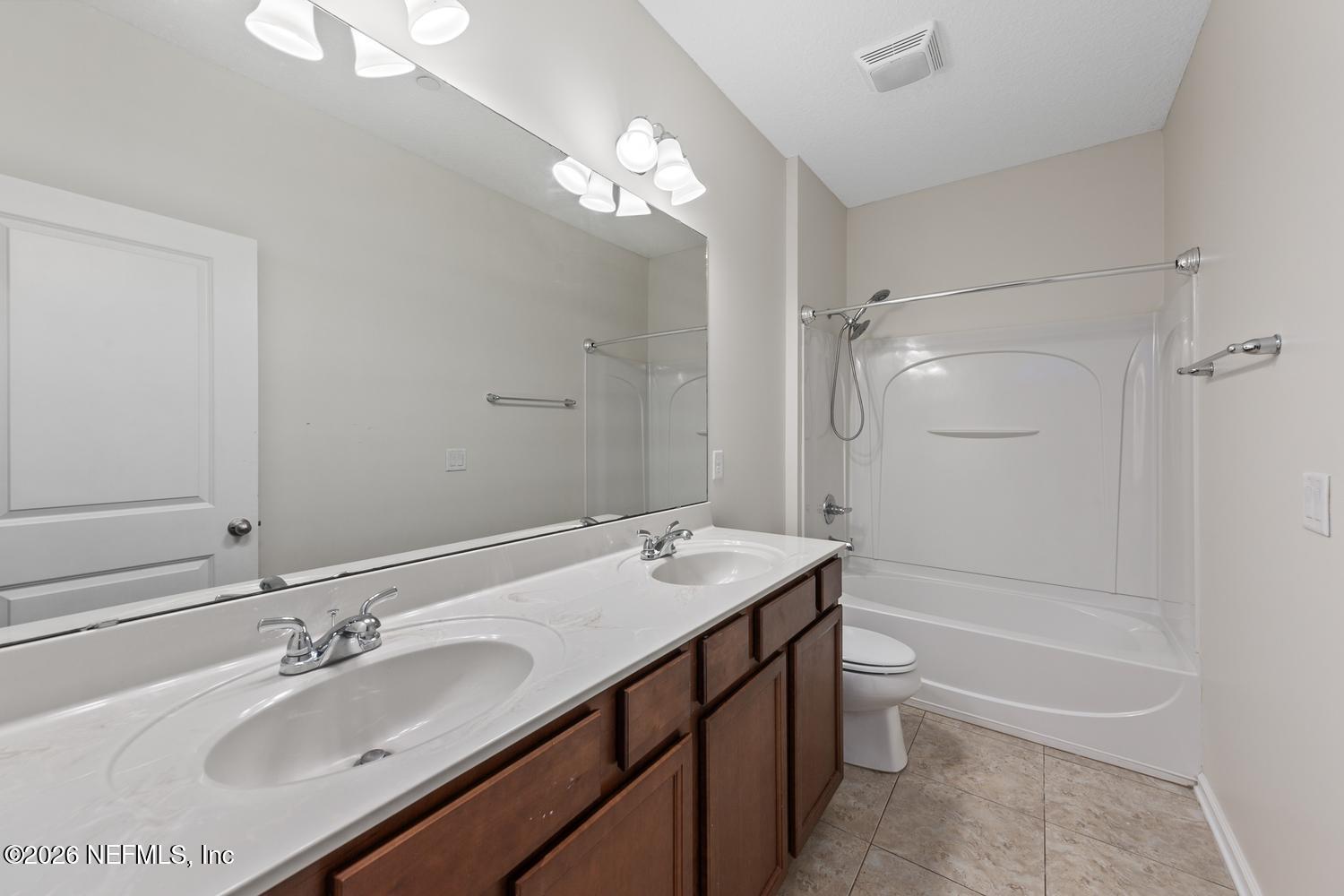 29 Myrtle Park Point Ponte Vedra, FL 32081 - Photo 35 of 59 a bathroom with a tub a sink and mirror