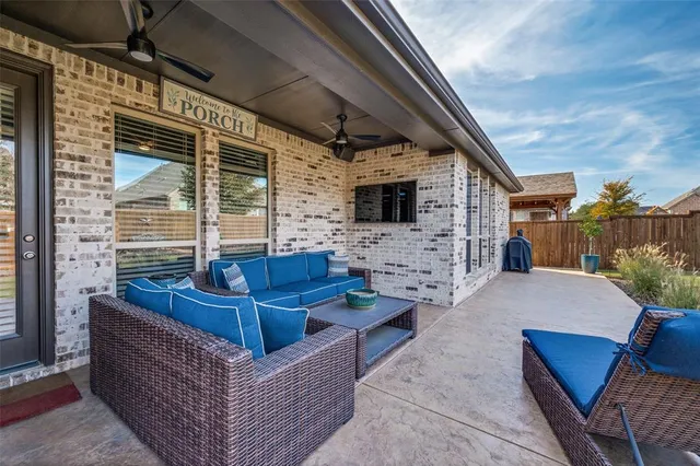 a view of house with outdoor seating