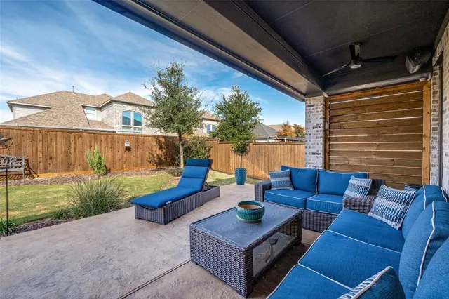 a outdoor space with patio the couches and a dining table with the garden view