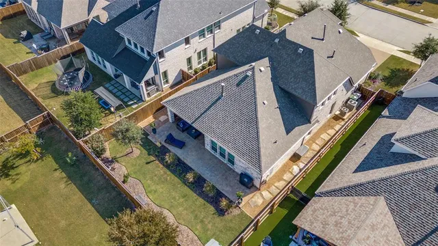 an aerial view of a house with stairs