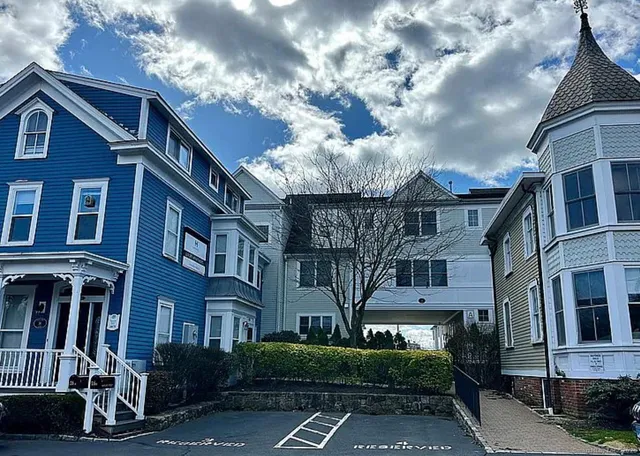 a front view of a multi story building