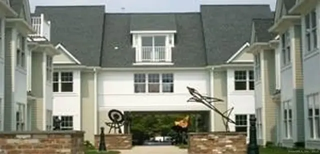 a front view of a house with glass windows
