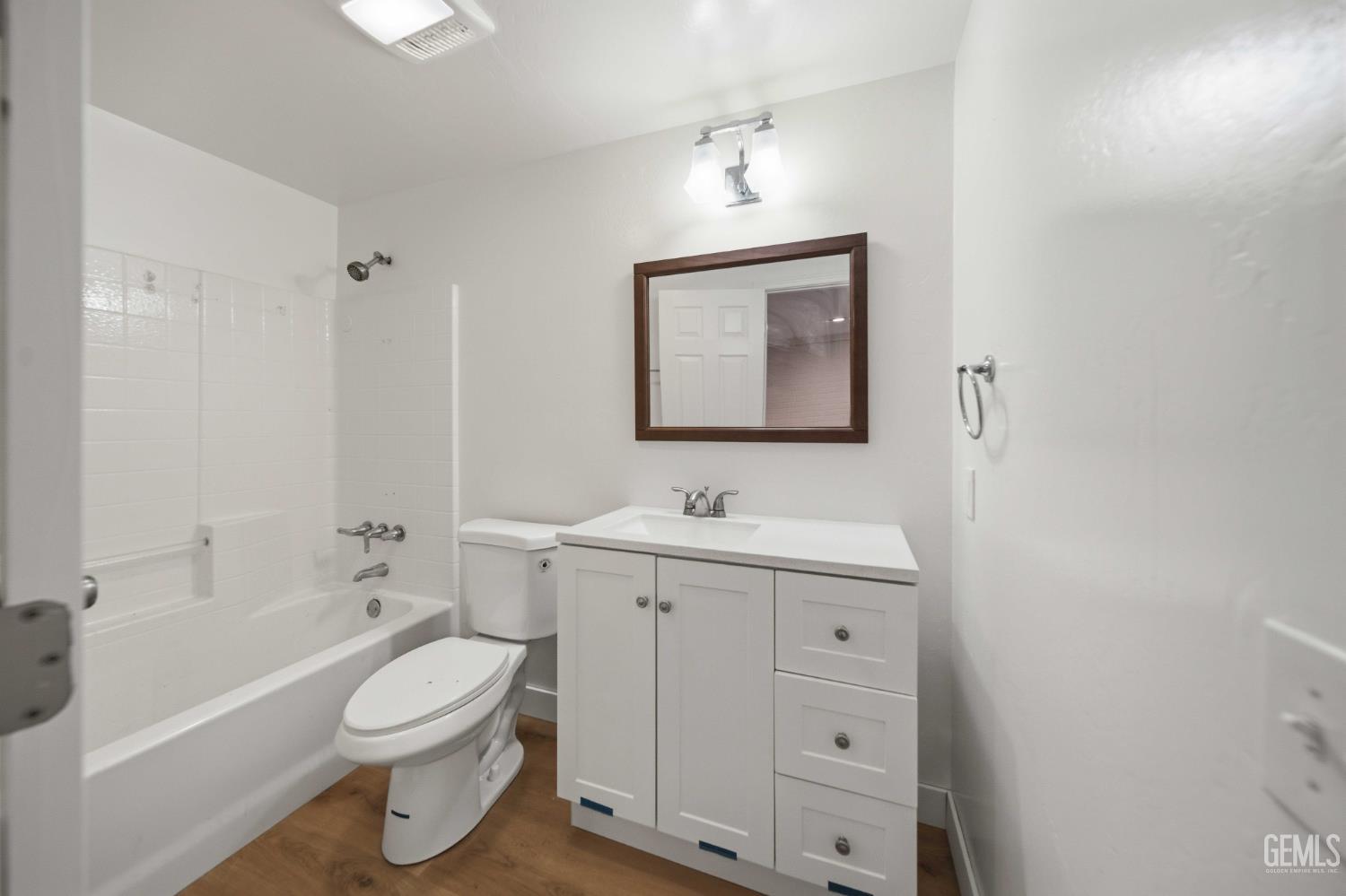 Undisclosed Address Lebec, CA 93243 - Photo 24 of 29 a bathroom with a toilet a sink a tub and mirror