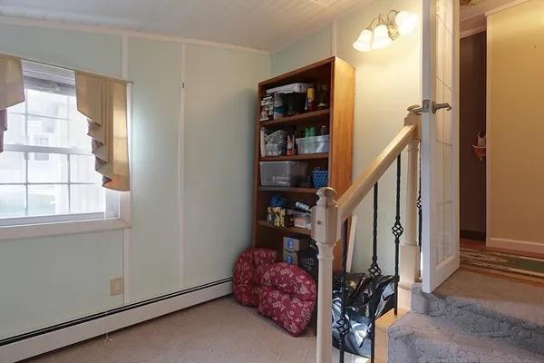 a view of entryway with a window and storage