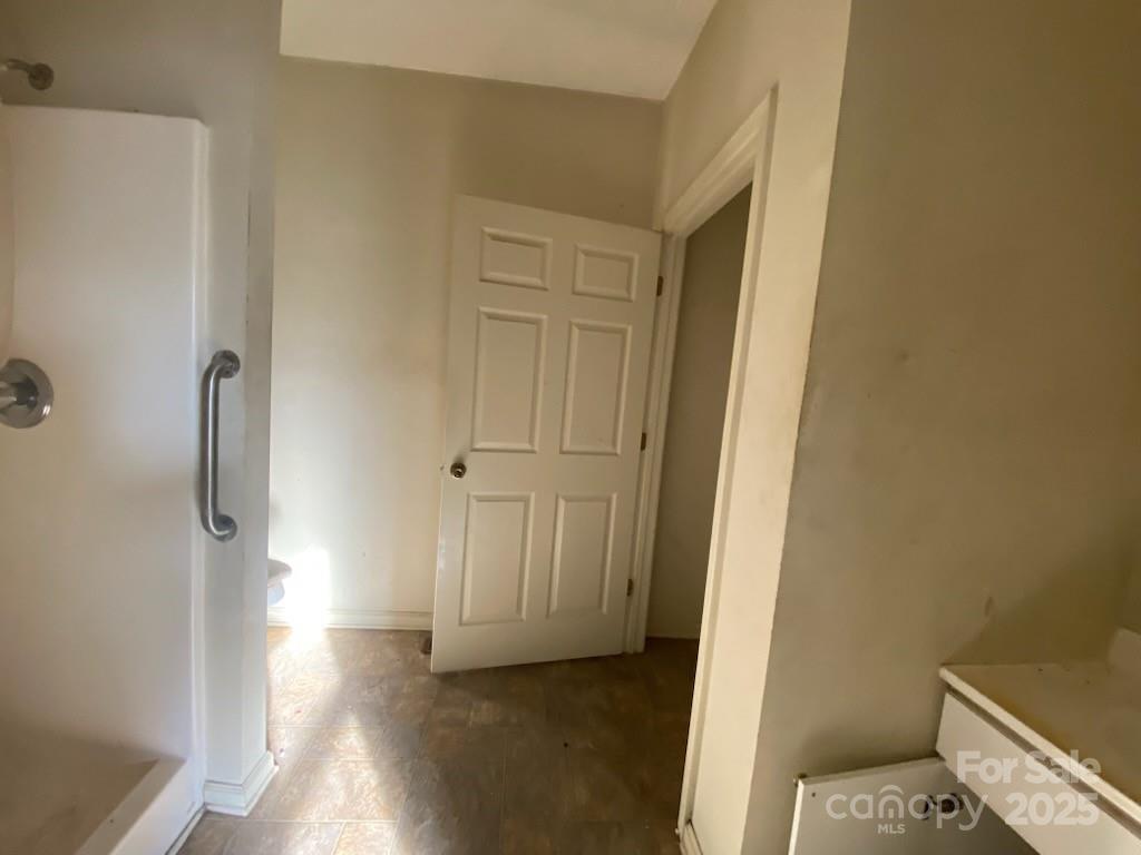 120 Seaboard Street Rockingham, NC 28379 - Photo 12 of 21 a view of a room with wooden floor and bathroom