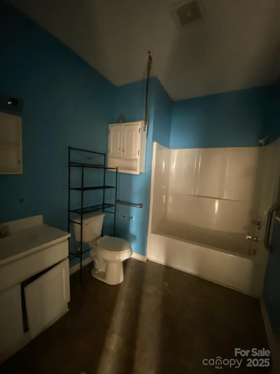 120 Seaboard Street Rockingham, NC 28379 - Photo 18 of 21 a bathroom with a toilet and a sink