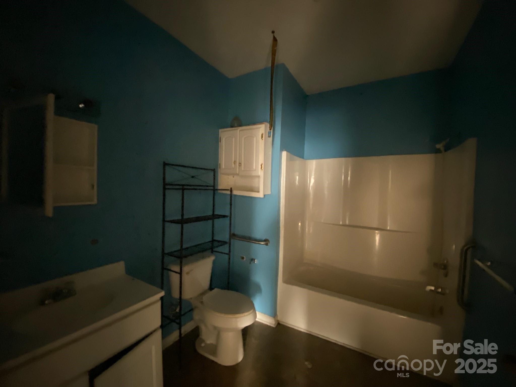 120 Seaboard Street Rockingham, NC 28379 - Photo 19 of 21 a bathroom with a toilet and a shower