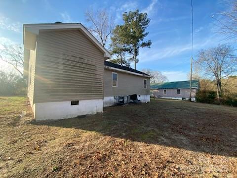 120 Seaboard Street Rockingham, NC 28379 - Photo 3 of 21 a backyard of a house