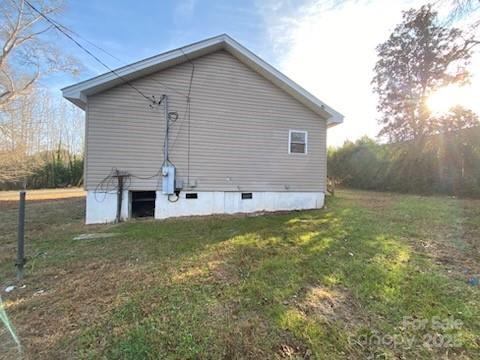 120 Seaboard Street Rockingham, NC 28379 - Photo 5 of 21 a view of a house with a yard