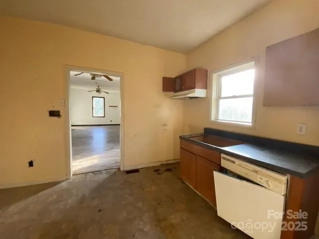 an empty room with windows