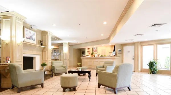 a room with gym equipment and large window