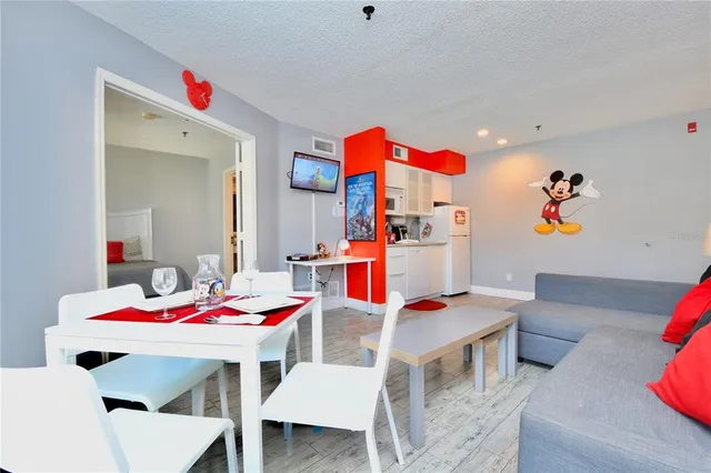 a living room with furniture and a table