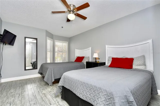 a view of a swimming pool with outdoor seating