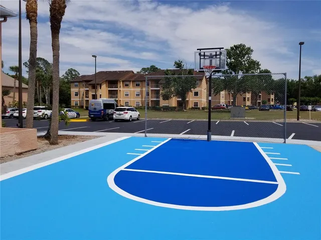 a living room with furniture and next to a window