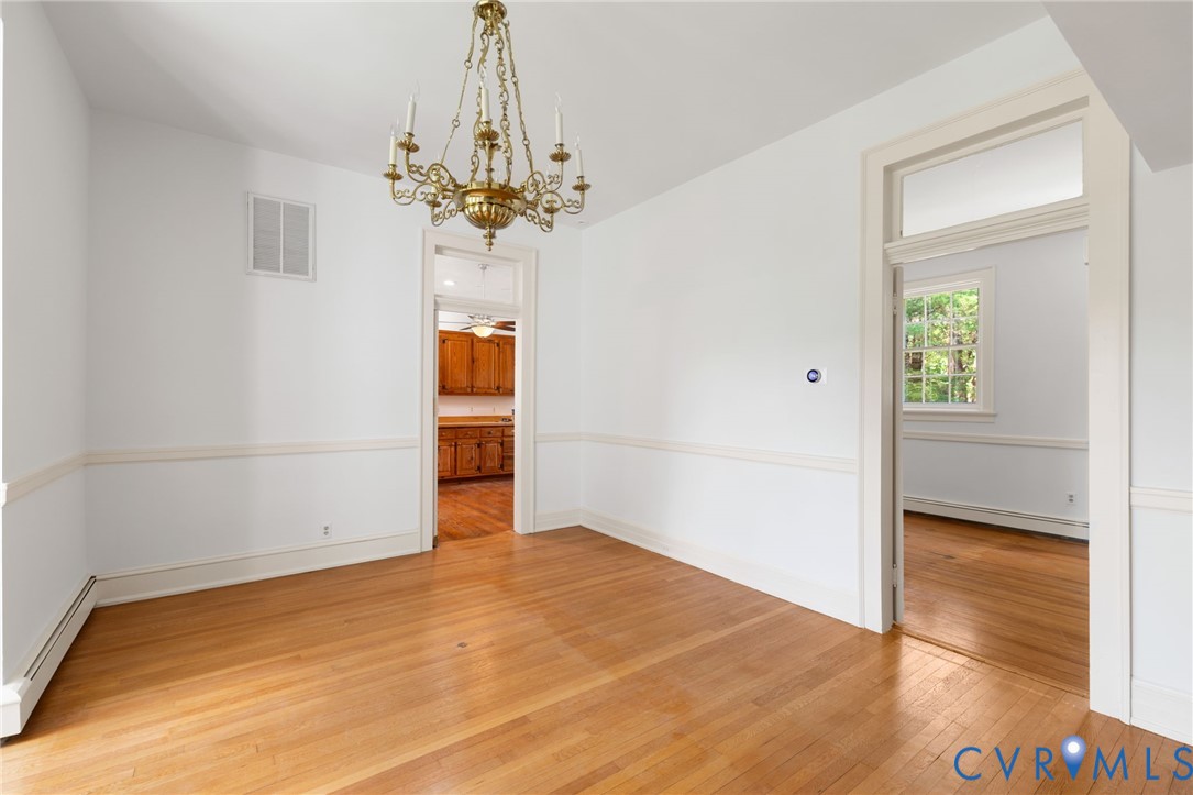 209 Ross Road Henrico, VA 23229 - Photo 16 of 43 Hardwood flooring throughout, brass chandelier, ch