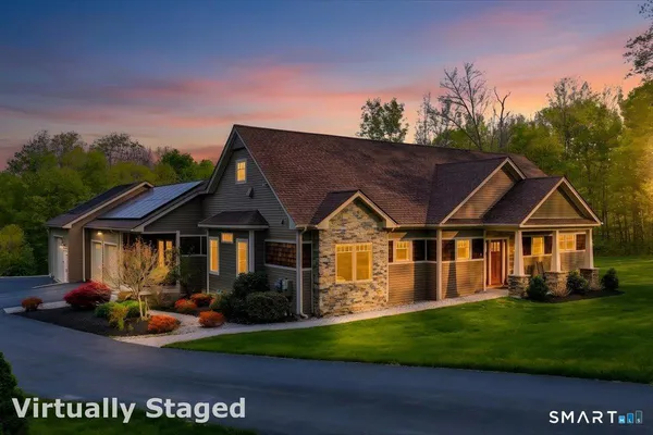 front view of a house with a yard