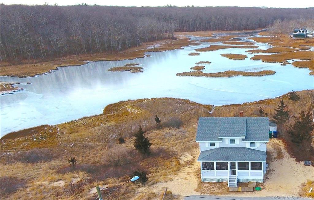 27 Champion Road Old Lyme, CT 06371 - Photo 1 of 1 incredible location with Lond Island Sound outside the front door and a beautiful marsh outside the back door!