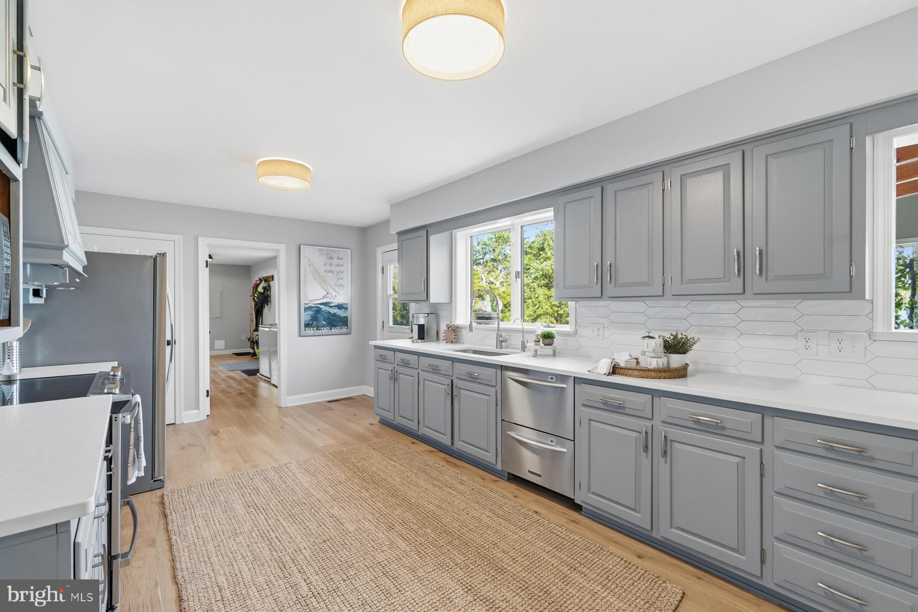 25500 Chance Farm Road St. Michaels, MD 21663 - Photo 15 of 43 a kitchen with sink and cabinets