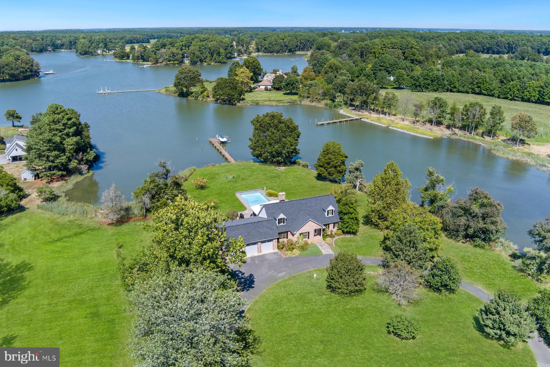 25500 Chance Farm Road St. Michaels, MD 21663 - Photo 3 of 43 an aerial view of a houses with a lake view
