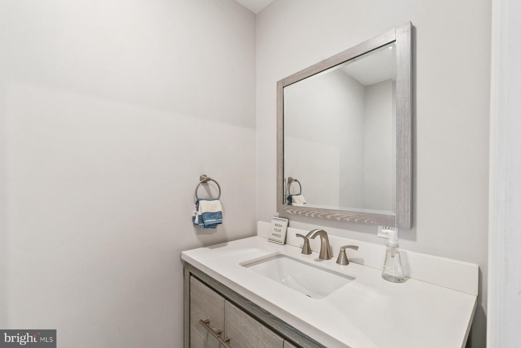 25500 Chance Farm Road St. Michaels, MD 21663 - Photo 31 of 43 a bathroom with a sink and a mirror