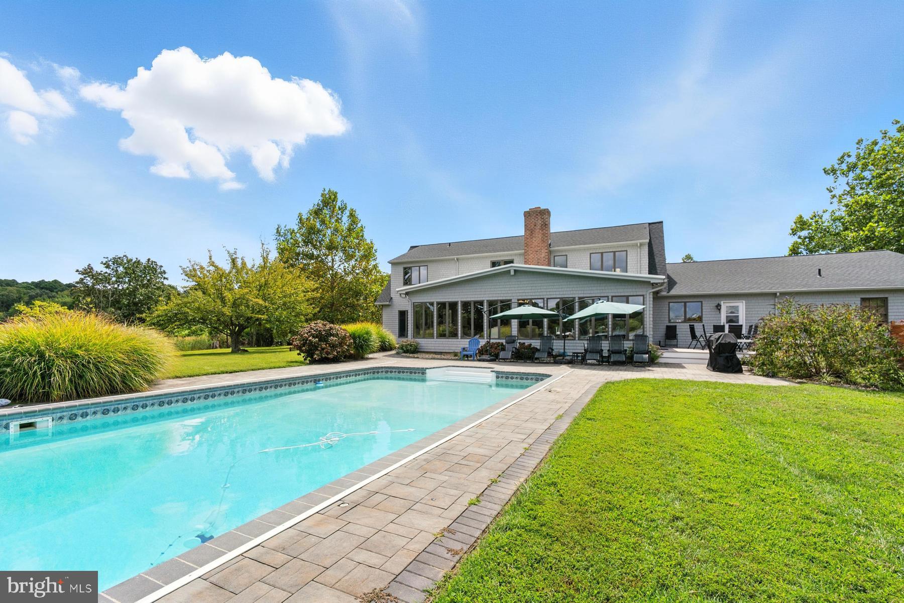 25500 Chance Farm Road St. Michaels, MD 21663 - Photo 32 of 43 a view of a house with swimming pool yard and outdoor seating