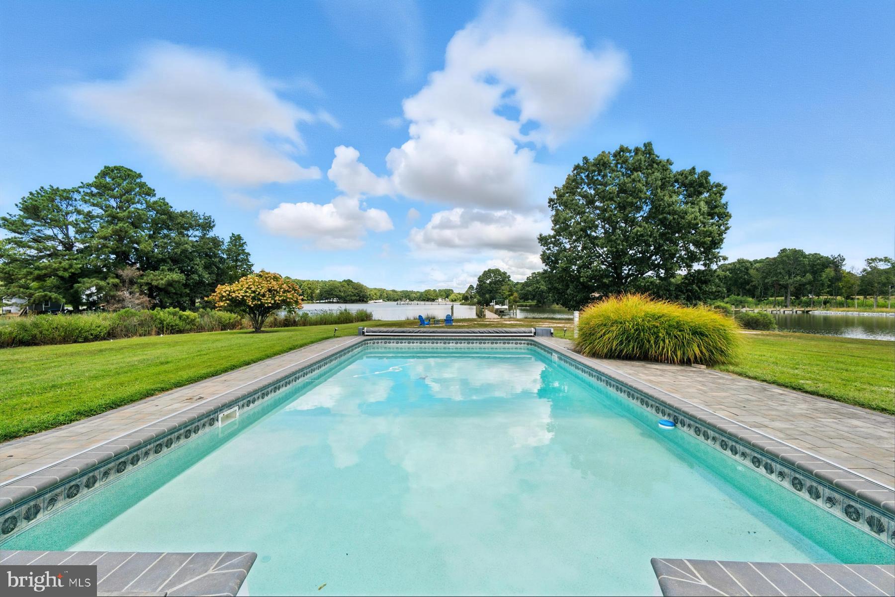 25500 Chance Farm Road St. Michaels, MD 21663 - Photo 33 of 43 a view of swimming pool with a garden