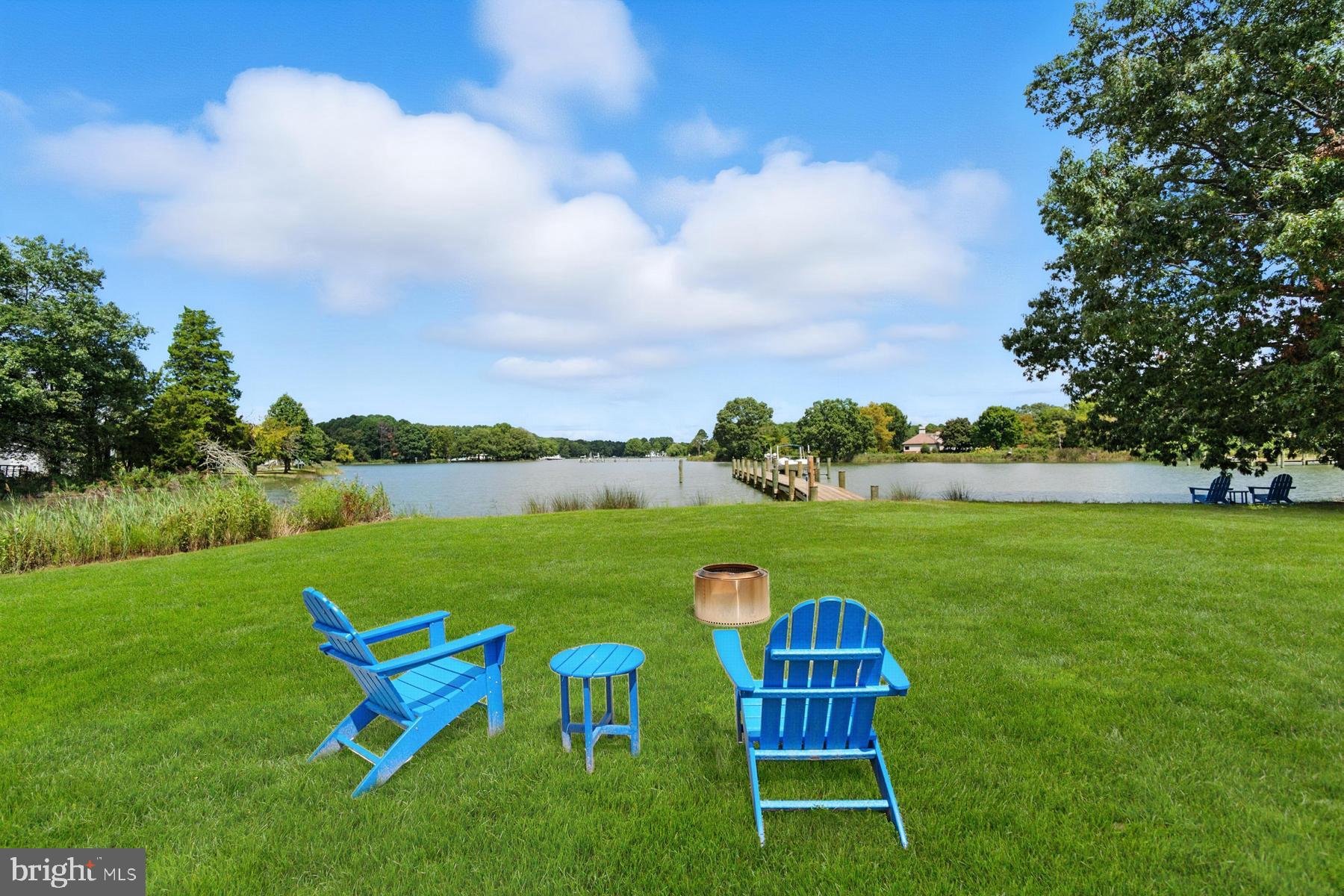 25500 Chance Farm Road St. Michaels, MD 21663 - Photo 35 of 43 a view of a lake with couches in the garden