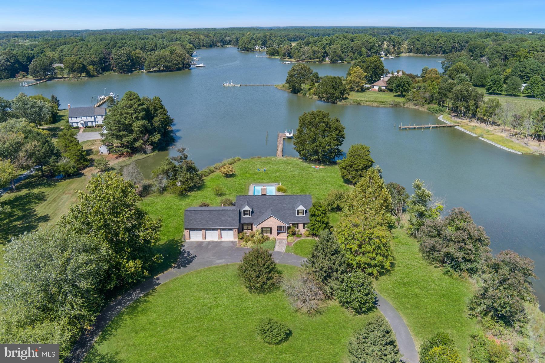 25500 Chance Farm Road St. Michaels, MD 21663 - Photo 4 of 43 an aerial view of a house with a lake view