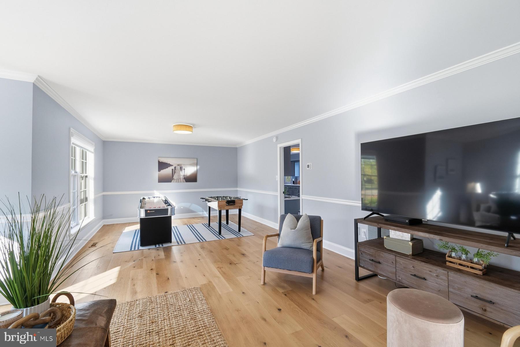 25500 Chance Farm Road St. Michaels, MD 21663 - Photo 8 of 43 a living room with furniture and a flat screen tv