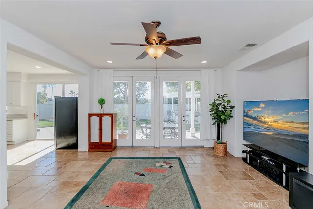 a living room with furniture and a rug