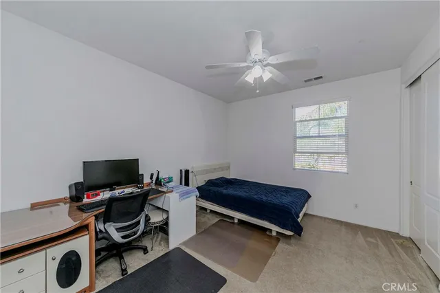 a bathroom with a double vanity sink and mirror