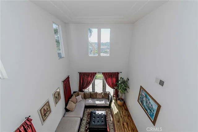 a white toilet sitting next to a bath tub