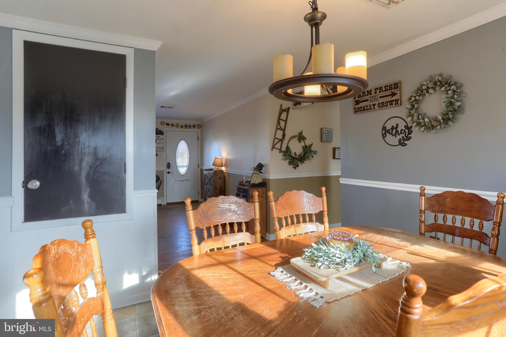 3032 Tunnel Hill Road Lebanon, PA 17046 - Photo 14 of 52 a bedroom with furniture and a chandelier