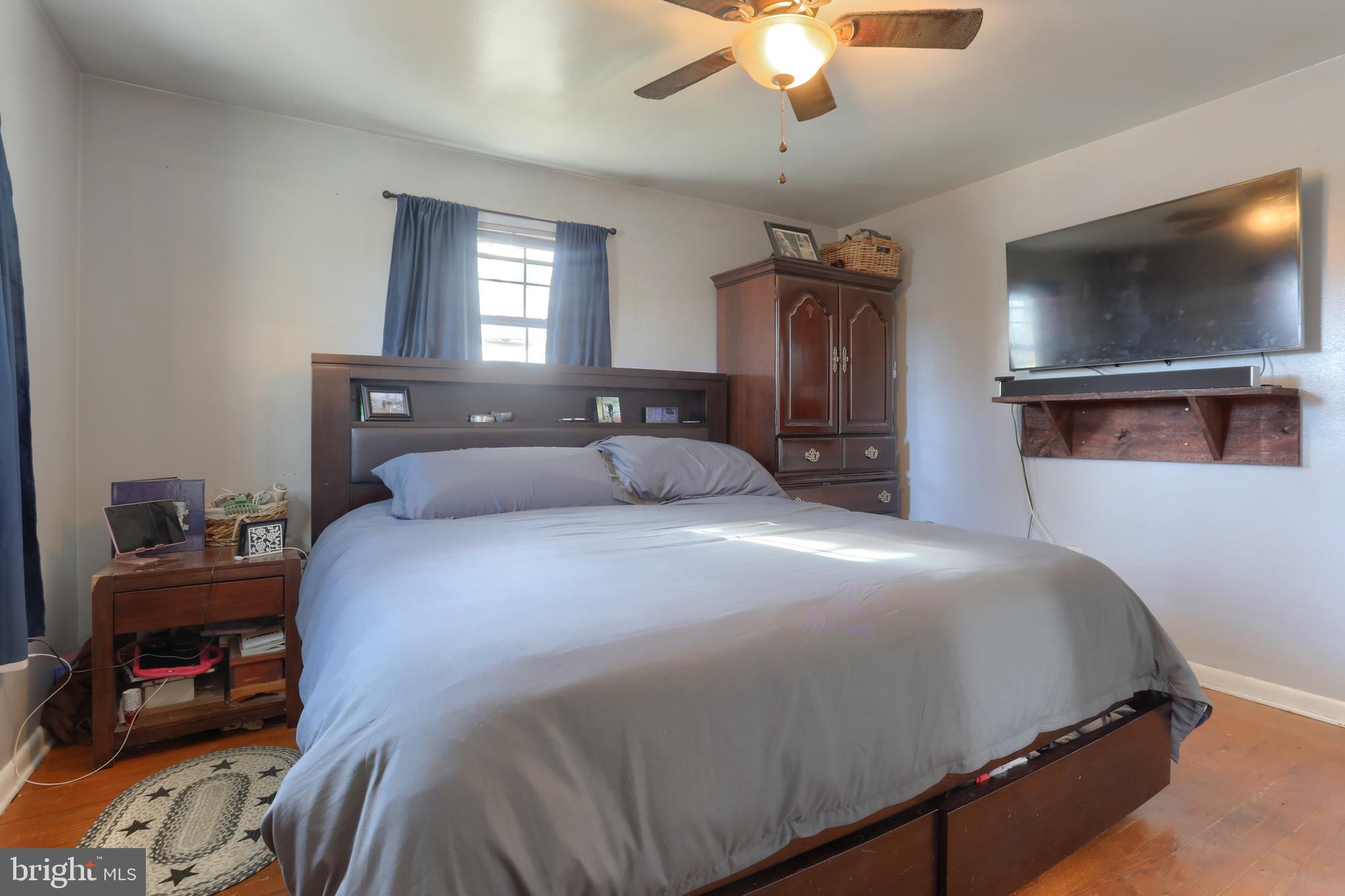 3032 Tunnel Hill Road Lebanon, PA 17046 - Photo 16 of 52 a bedroom with a bed and a tv