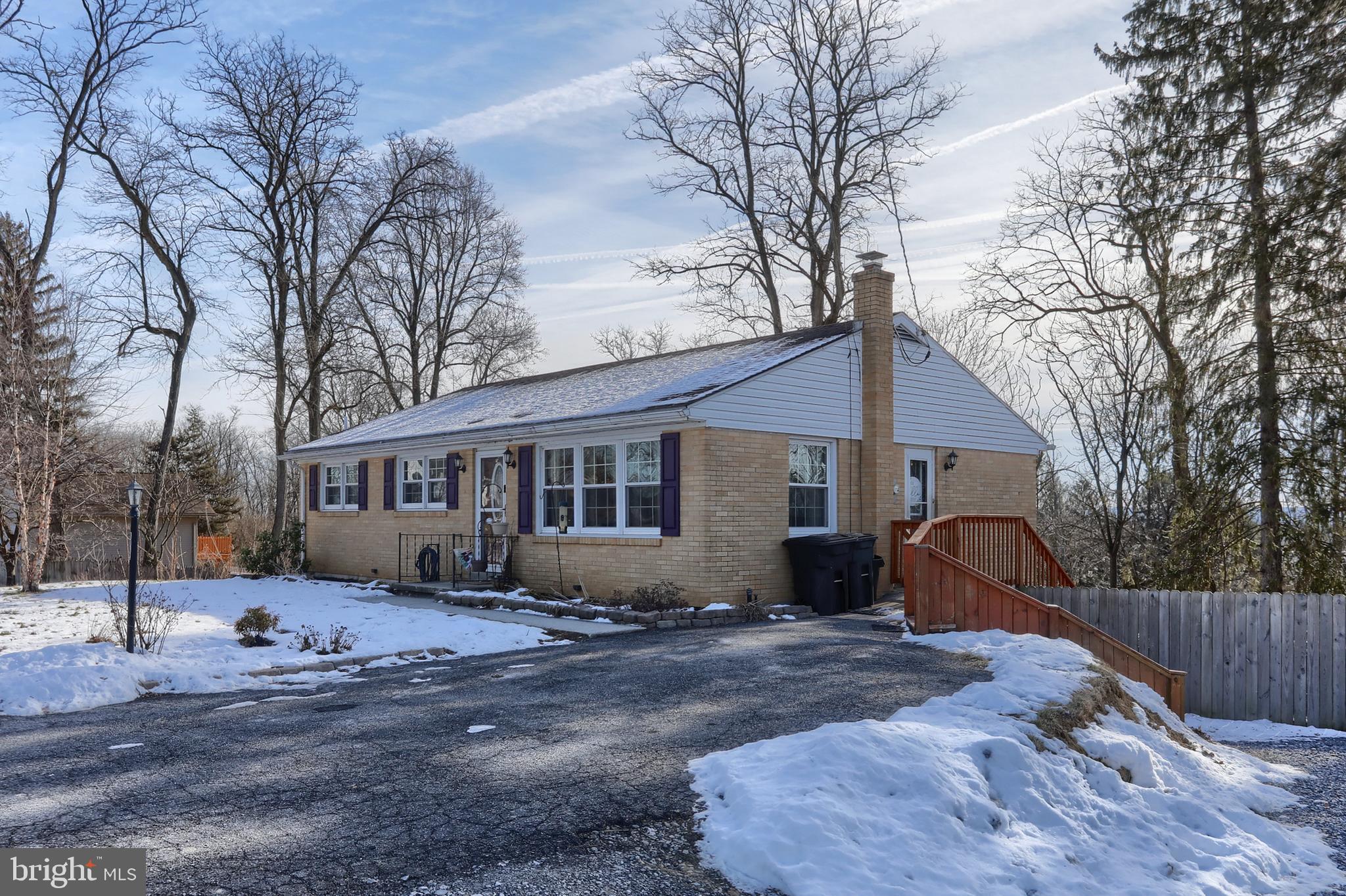 3032 Tunnel Hill Road Lebanon, PA 17046 - Photo 3 of 52 a view of a house with a yard covered with snow