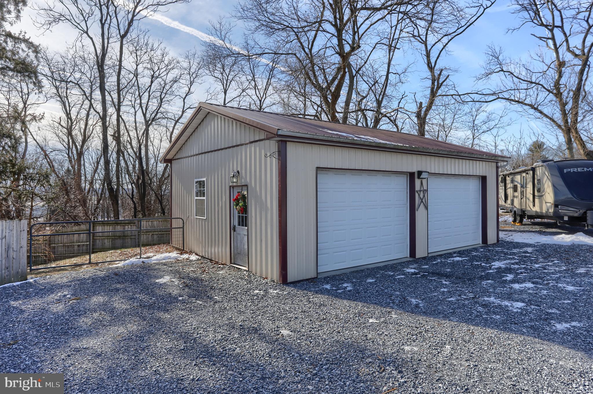 3032 Tunnel Hill Road Lebanon, PA 17046 - Photo 31 of 52 a view of a house with a large tree and wooden fence