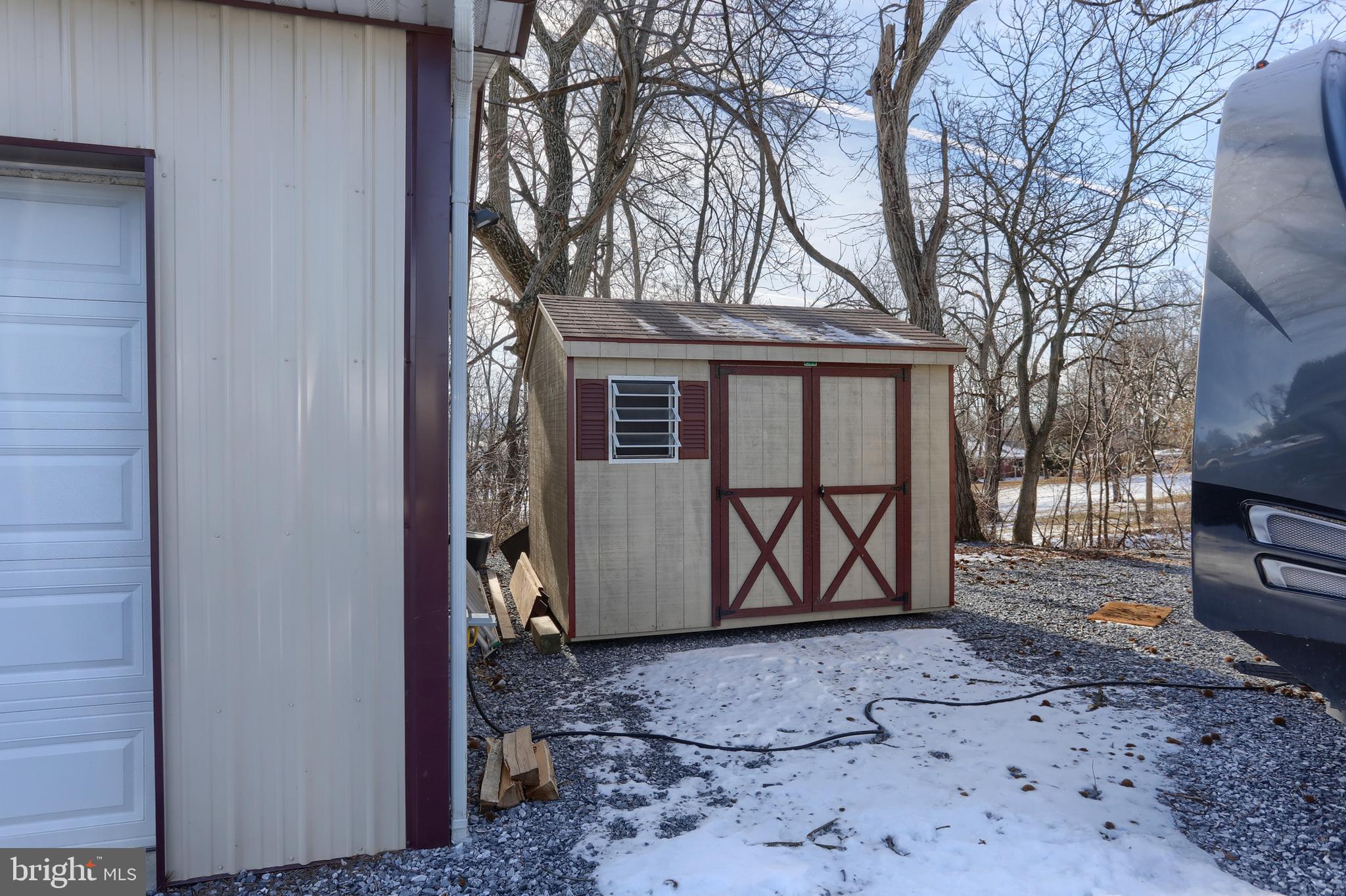 3032 Tunnel Hill Road Lebanon, PA 17046 - Photo 36 of 52 a view of a house with a wooden fence and a tree