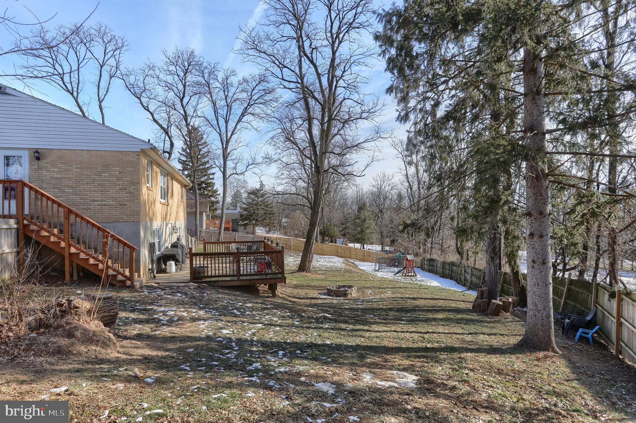 3032 Tunnel Hill Road Lebanon, PA 17046 - Photo 40 of 52 a backyard of a house with trees and outdoor seating