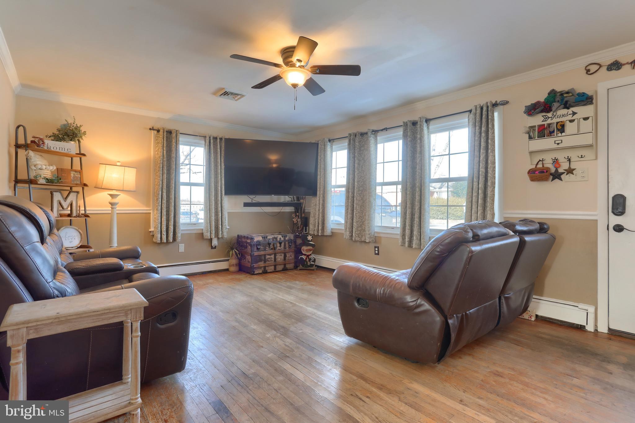3032 Tunnel Hill Road Lebanon, PA 17046 - Photo 4 of 52 a living room with furniture fireplace and a large window