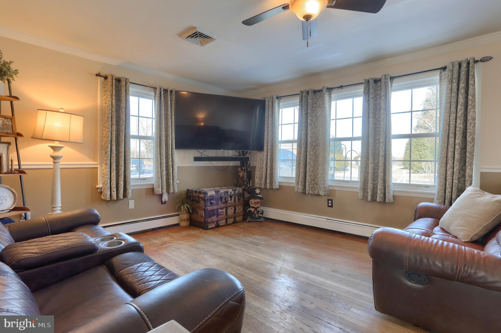 3032 Tunnel Hill Road Lebanon, PA 17046 - Photo 5 of 52 a living room with furniture and a fireplace